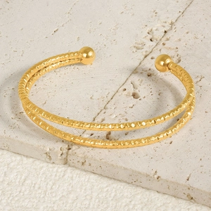 Double-layered 18k gold plated stainless steel open bangle with hammered texture finish