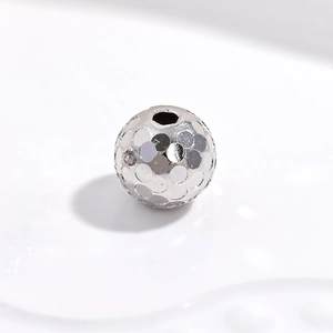 Macro shot of S925 sterling silver hammered texture sphere beads for jewelry DIY