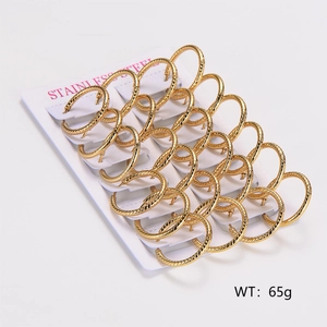 Set of 12 pairs of large gold stainless steel hoop earrings in a bulk packaging view