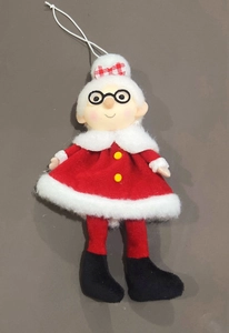 Detail of felt Mrs. Claus hanging ornament with red outfit and white hair for Christmas
