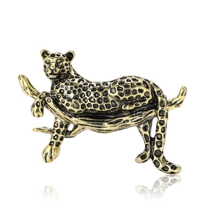 Vintage leopard brooch in gold alloy with black enamel spots on a branch for men's suit coat