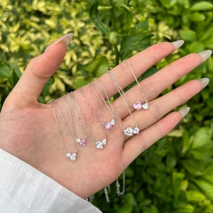 Close-up of S925 silver necklace with pink and white heart-shaped zircon stones