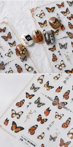 Detail of 5D embossed nail stickers featuring Maillard butterflies and Chinese motifs