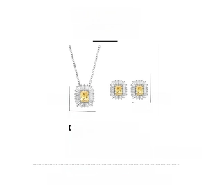 Detail view of S925 silver jewelry set with yellow rectangular stones and halo diamonds