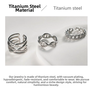 Macro shot of silver titanium steel rings with multi-layer pavé crystals and chain links