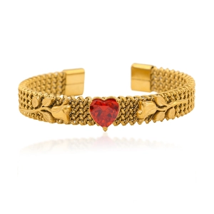 Detail of gold woven open bracelet featuring heart ruby with 3D rose and leaf carving
