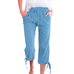 Detail view of light blue cotton linen cropped wide-leg pants with drawstring and ties