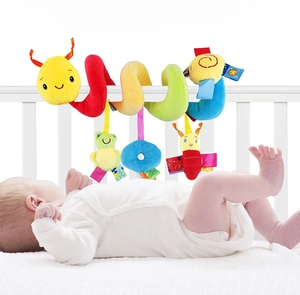 Colorful spiral baby activity plush toy with hanging animals wrapped on white crib rails