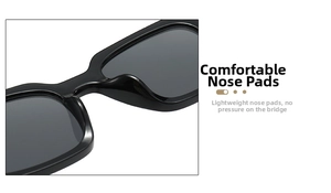 Detail of ergonomic integrated nose pads on black square frame sunglasses for comfort