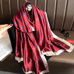 Burgundy silk-like camellia floral print scarf with elegant beige border and satin finish