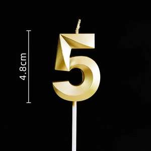 Detail of golden number 5 birthday candle with geometric facets and 4.8cm height label