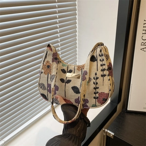 Vintage floral printed shoulder bag in beige fabric with stylish patchwork design