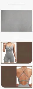 Detailed view of grey backless yoga bodysuit featuring cross-strap design and knit texture