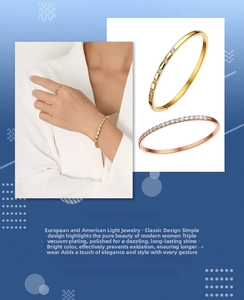 Detail of titanium steel bangle set with zircon inlay in gold and rose gold finishes