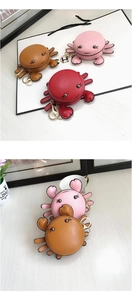 Three colors of cute crab-shaped PU leather coin purses with golden keychains