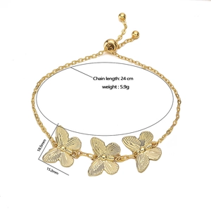 Adjustable gold butterfly charm bracelet, 24cm chain length with three 18.5mm butterflies