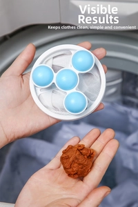 Detail of floating laundry filter bag showing blue foam balls and collected lint.