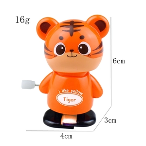 Wind-up walking orange tiger toy with product dimensions of 6cm height and 16g weight