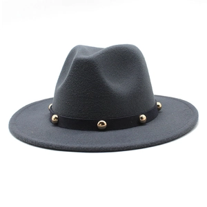 Detail of dark grey wool felt hat with black ribbon featuring gold round stud accents