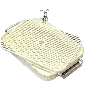 Rectangle beige tea tray with silver handles and a decorative rabbit drain board