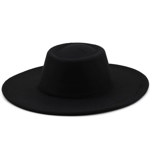 Detail of the high-quality black wool felt material and flat top crown of this classic hat