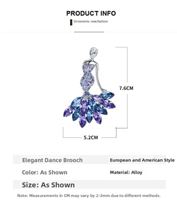 Detail view of dancing girl brooch with blue crystal skirt, size 7.6cm by 5.2cm