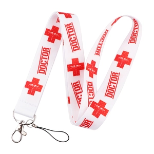 Detailed view of white polyester lanyard with red doctor print and metal lobster clasp