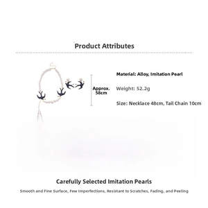 Detailed view of pearl necklace with black swallow pendants showing 48cm length measurement