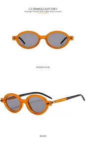 Detail view of oval jelly orange sunglasses with light grey lenses and C3 model marking