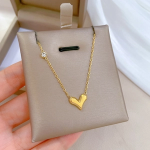 Minimalist gold plated titanium steel heart pendant necklace with zircon stone detail