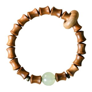 Bamboo-style green sandalwood bead bracelet with luminous bead and natural wood grain