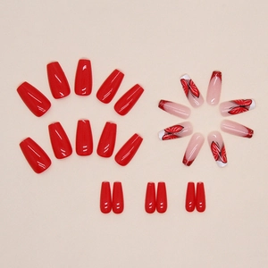 Deep red ballerina press-on nails featuring glitter French tips and butterfly designs