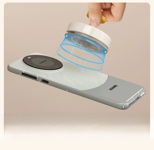 Close-up of detachable magnetic ring stand on gray phone case with golden loop
