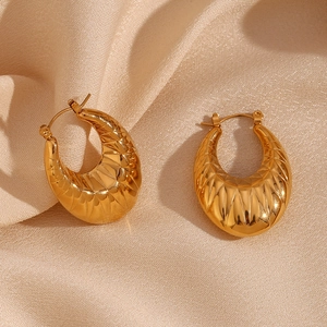 18K gold plated stainless steel hollow oval hoop earrings with radial pleated texture