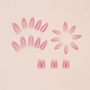 French cat eye almond press-on nails with 3D white flowers and soft pink glitter finish