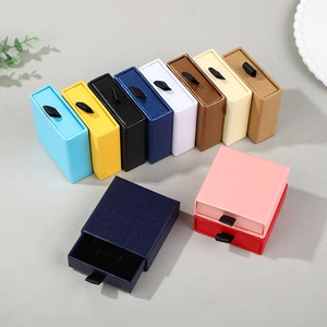 Colorful cardboard drawer jewelry boxes for rings and earrings in a premium minimalist display