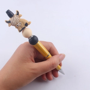 Creative yellow highland cow silicone beaded ballpoint pen with decorative crystal ring