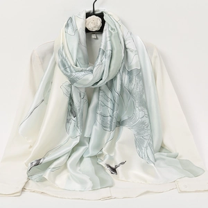 Elegant mint green silk scarf with lotus leaf and bird prints for a stylish autumn look