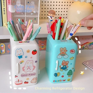 Detailed view of cute refrigerator-shaped pen holders in white and blue with 3D stickers