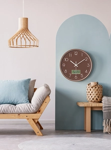 Modern brown wall clock with white Arabic numerals and a built-in LCD calendar display