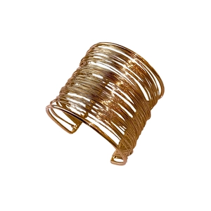 Exaggerated layered gold open bangle bracelet with multi-strand minimalist geometric design