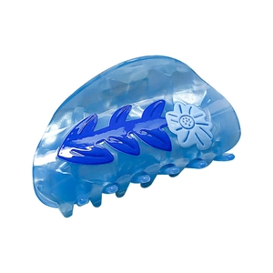 Sky blue acetate hair claw clip with floral pattern for elegant minimalist hairstyling