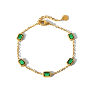 Gold-plated stainless steel bracelet with five rectangular green zircon stones on white background