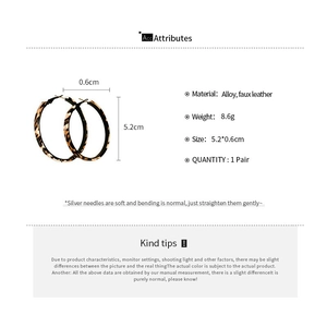 Detail showing faux leather leopard print hoop earrings with 5.2cm diameter and alloy material