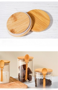 Detail view of airtight bamboo lid with silicone ring and wooden spoon for glass jar