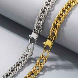 Polished silver and gold titanium steel curb chain necklaces with textured woven links