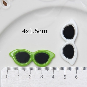 Macro view of 4cm resin sunglasses accessories for DIY phone cases and hair crafts