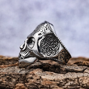 Vintage punk skull ring in silver stainless steel with detailed floral carvings on bark