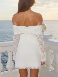 Elegant white off-shoulder lace mini dress with long sheer sleeves and slim fit design