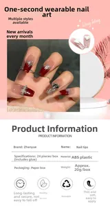 Detail view of burgundy gradient press-on nails with sparkling glitter and heart charms